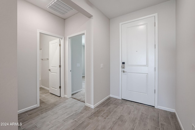 entrance foyer featuring light hardwood / wood-style floors