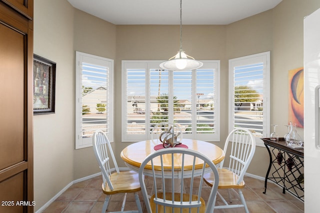 view of tiled dining space