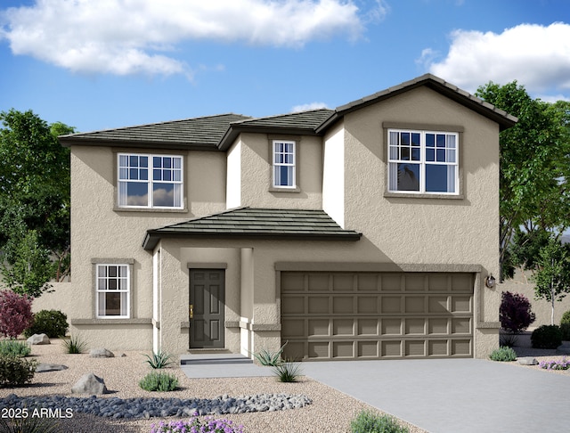 traditional home featuring driveway, an attached garage, and stucco siding