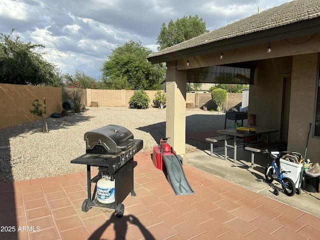 view of patio / terrace featuring a gazebo and grilling area