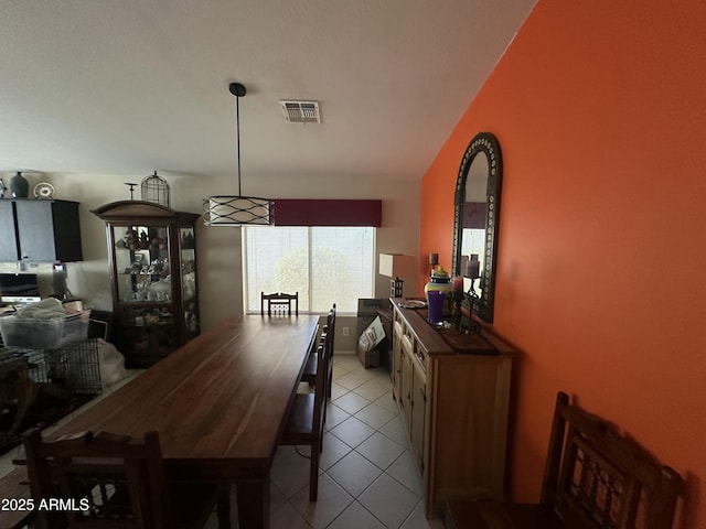 dining room with light tile patterned flooring