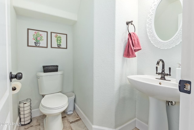 bathroom featuring toilet