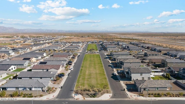 aerial view with a mountain view and a residential view