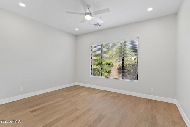 19550 N Grayhawk Dr Unit 1144, Scottsdale, AZ 85255 - unfurnished room with light wood-style floors, recessed lighting, and ceiling fan