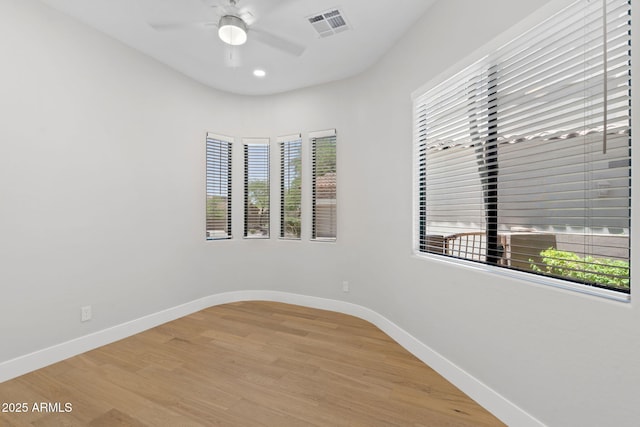 19550 N Grayhawk Dr Unit 1144, Scottsdale, AZ 85255 - unfurnished room featuring plenty of natural light, light wood finished floors, a ceiling fan, and recessed lighting