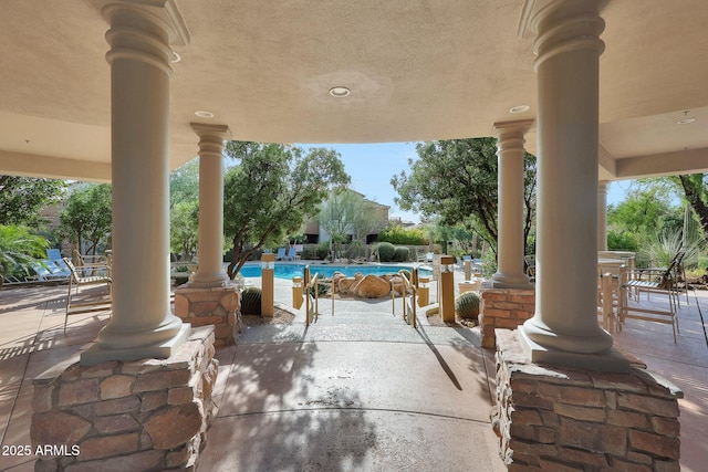 19550 N Grayhawk Dr Unit 1144, Scottsdale, AZ 85255 - view of patio / terrace with a community pool