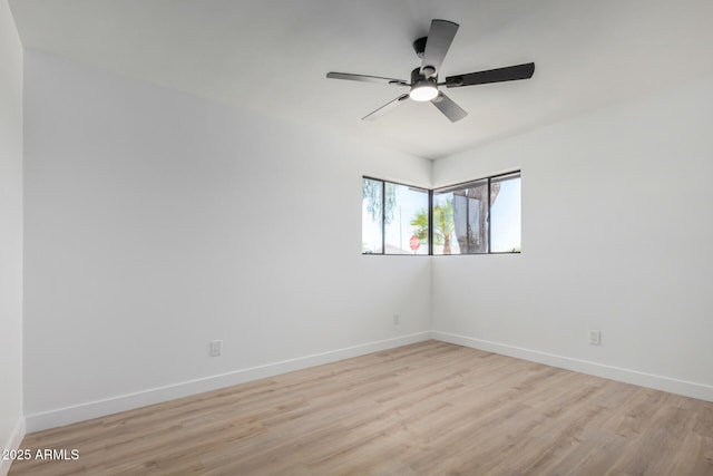 3802 N 48th Dr, Phoenix, AZ 85031 - unfurnished room featuring baseboards, ceiling fan, and wood finished floors