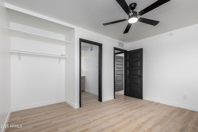 3802 N 48th Dr, Phoenix, AZ 85031 - unfurnished bedroom featuring ceiling fan, baseboards, visible vents, and wood finished floors