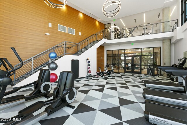 3131 N Central Ave Unit 3009, Phoenix, AZ 85012 - gym with a towering ceiling and french doors