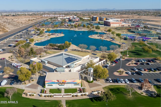 bird's eye view with a water view