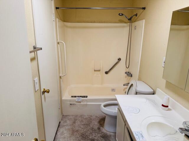 full bathroom featuring tile patterned flooring, vanity, toilet, and bathing tub / shower combination