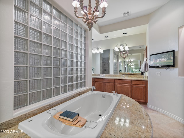 bathroom featuring visible vents, tiled shower, an inviting chandelier, vanity, and a bath