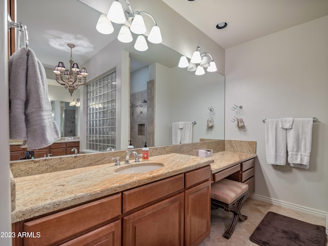 full bathroom with tile patterned floors, walk in shower, vanity, and a notable chandelier