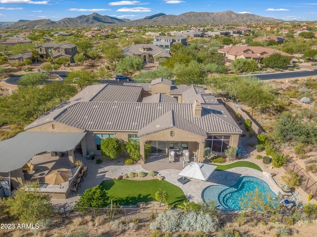 birds eye view of property featuring a residential view and a mountain view