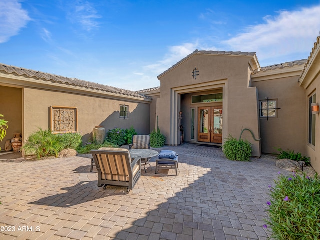 view of patio featuring french doors