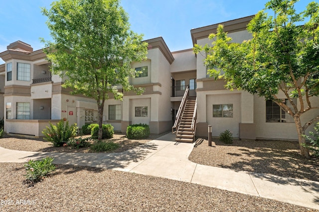 1941 S Pierpont Dr Unit 2015, Mesa, AZ 85206 - view of front of house featuring stairway and stucco siding