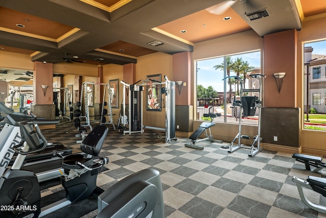 1941 S Pierpont Dr Unit 2015, Mesa, AZ 85206 - workout area with healthy amount of natural light, a ceiling fan, crown molding, coffered ceiling, and baseboards