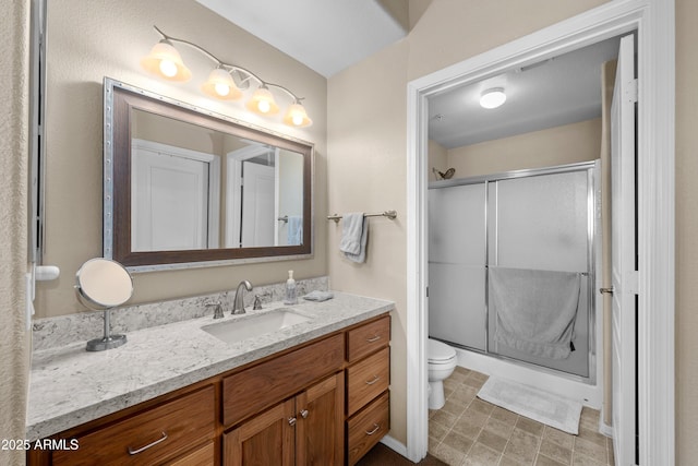 1941 S Pierpont Dr Unit 2015, Mesa, AZ 85206 - full bathroom featuring toilet, a stall shower, and vanity