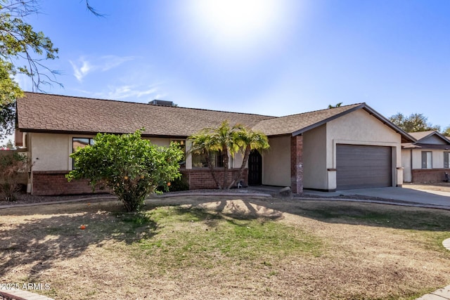 ranch-style home featuring a garage