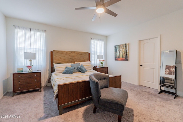 bedroom featuring carpet, baseboards, and ceiling fan