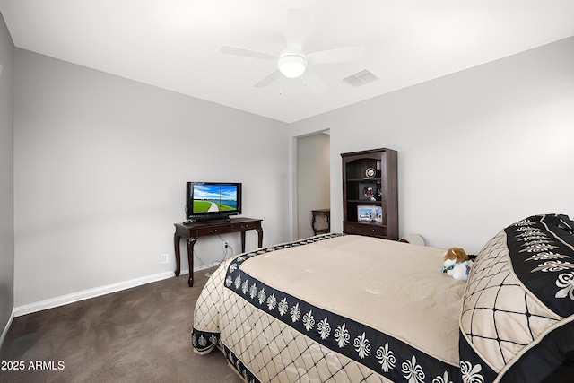 bedroom featuring dark colored carpet, visible vents, baseboards, and a ceiling fan