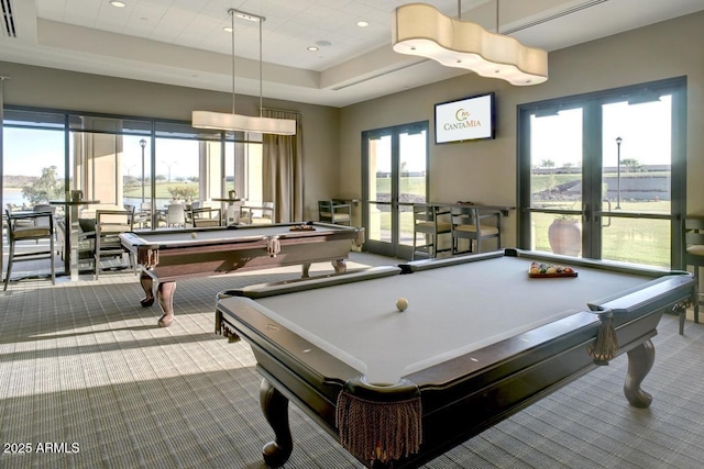 game room with pool table, recessed lighting, french doors, a raised ceiling, and carpet