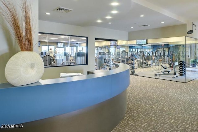 gym featuring visible vents, recessed lighting, and carpet flooring