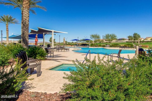 pool featuring a patio area