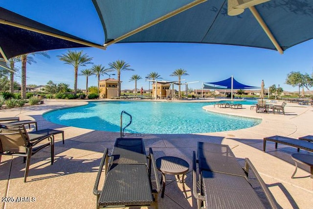community pool with a patio
