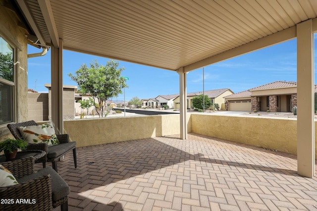 view of patio with a residential view