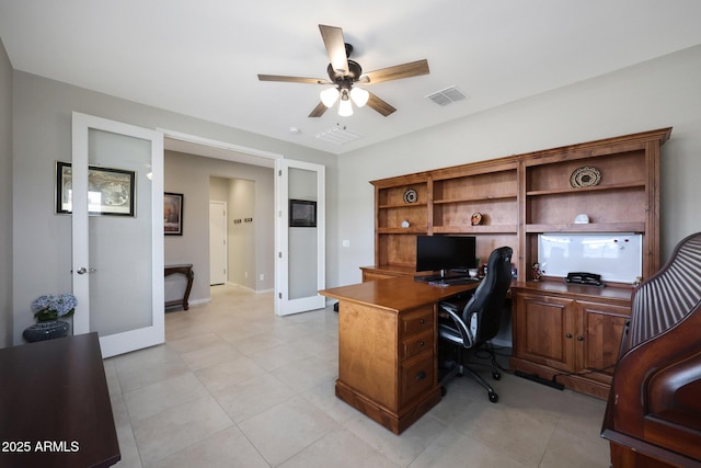 office space with ceiling fan, visible vents, light tile patterned flooring, french doors, and baseboards