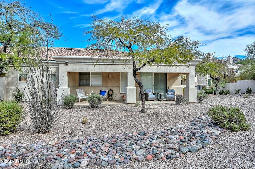 rear view of house with a patio area