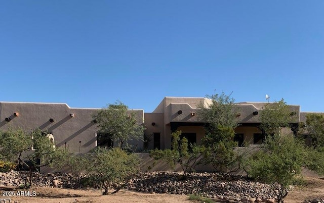 view of pueblo-style home