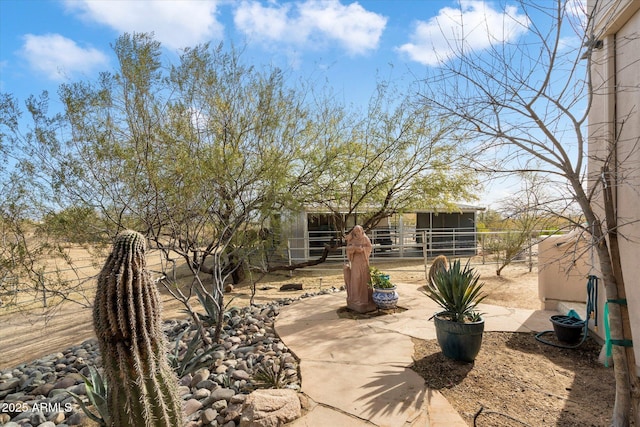 view of patio with an outdoor structure