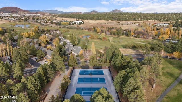 bird's eye view with a water and mountain view