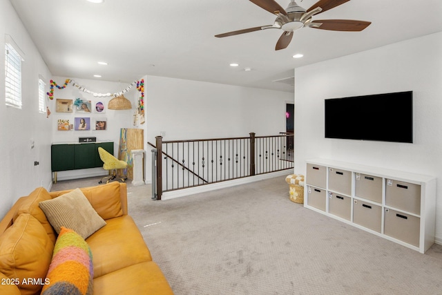 carpeted living room featuring recessed lighting and ceiling fan