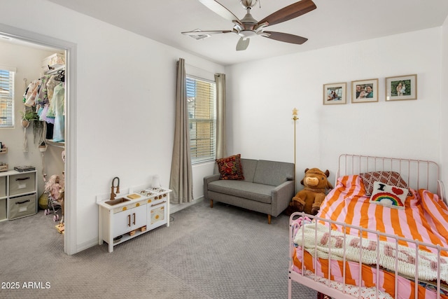 bedroom featuring visible vents, carpet floors, and ceiling fan