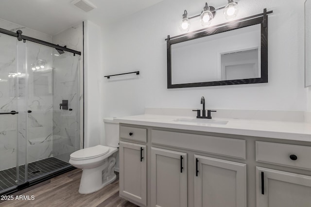 20100 N 78th Pl Unit 2114, Scottsdale, AZ 85255 - full bathroom with vanity, a marble finish shower, and wood finished floors