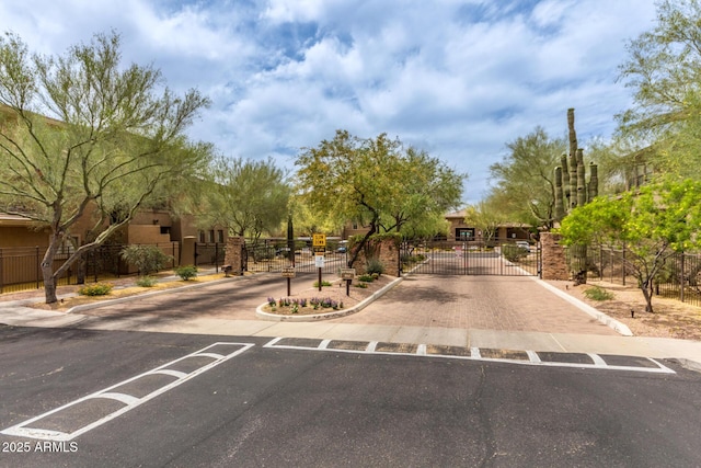 20100 N 78th Pl Unit 2114, Scottsdale, AZ 85255 - view of asphalt street with a gate, curbs, and a gated entry