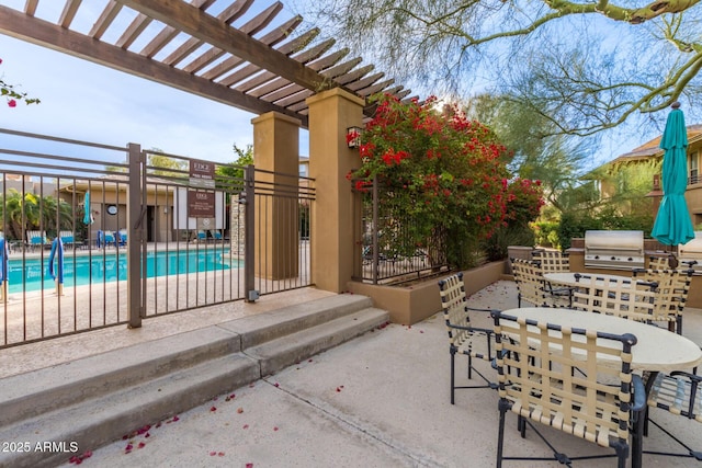 20100 N 78th Pl Unit 2114, Scottsdale, AZ 85255 - view of patio with area for grilling, a pergola, and a community pool