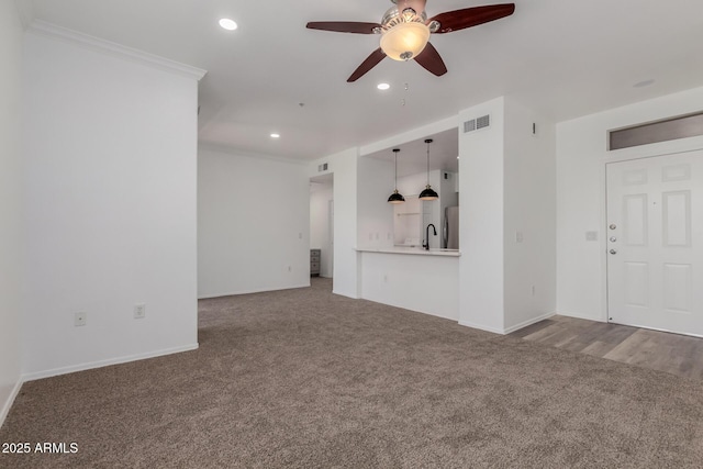 20100 N 78th Pl Unit 2114, Scottsdale, AZ 85255 - unfurnished living room with carpet floors, ceiling fan, ornamental molding, and recessed lighting