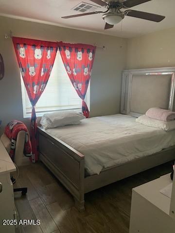 3431 W Campbell Ave, Phoenix, AZ 85017 - bedroom featuring a ceiling fan, light wood finished floors, and visible vents
