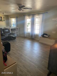 3431 W Campbell Ave, Phoenix, AZ 85017 - living room featuring baseboards, ceiling fan, and wood finished floors