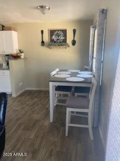 3431 W Campbell Ave, Phoenix, AZ 85017 - dining area featuring baseboards and dark wood finished floors