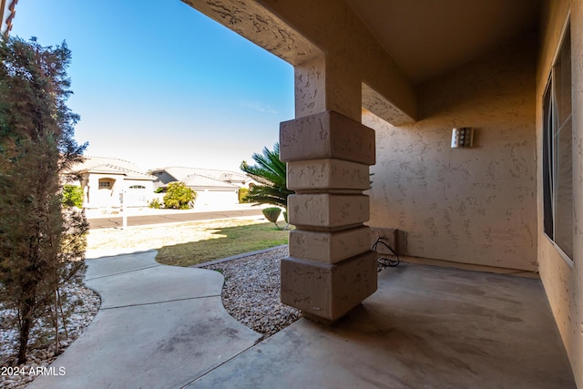 view of patio with a garage