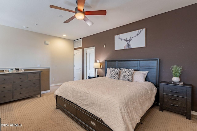 carpeted bedroom featuring ceiling fan