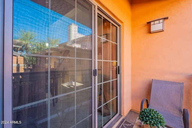 property entrance with a balcony