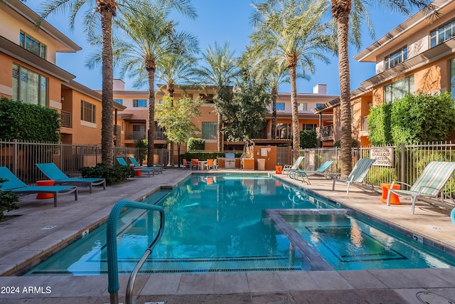 view of swimming pool with a patio area