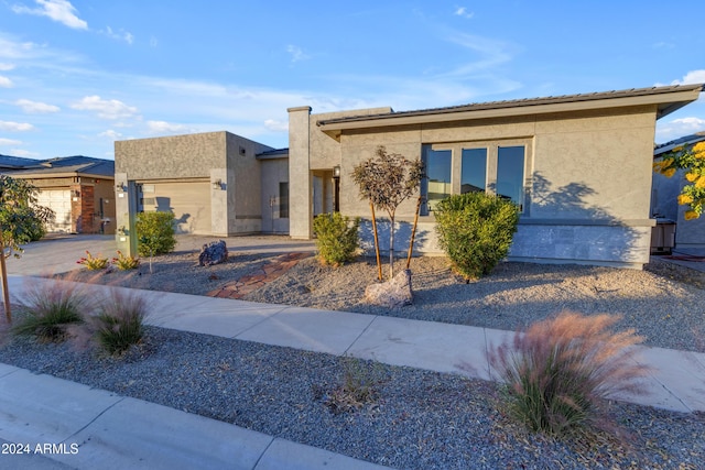 view of front of property with a garage