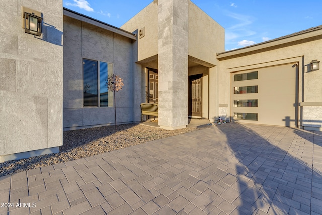 property entrance with a garage